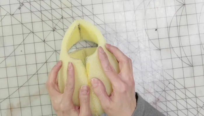 Glue mouth plate pieces to ultra suede using contact cement.